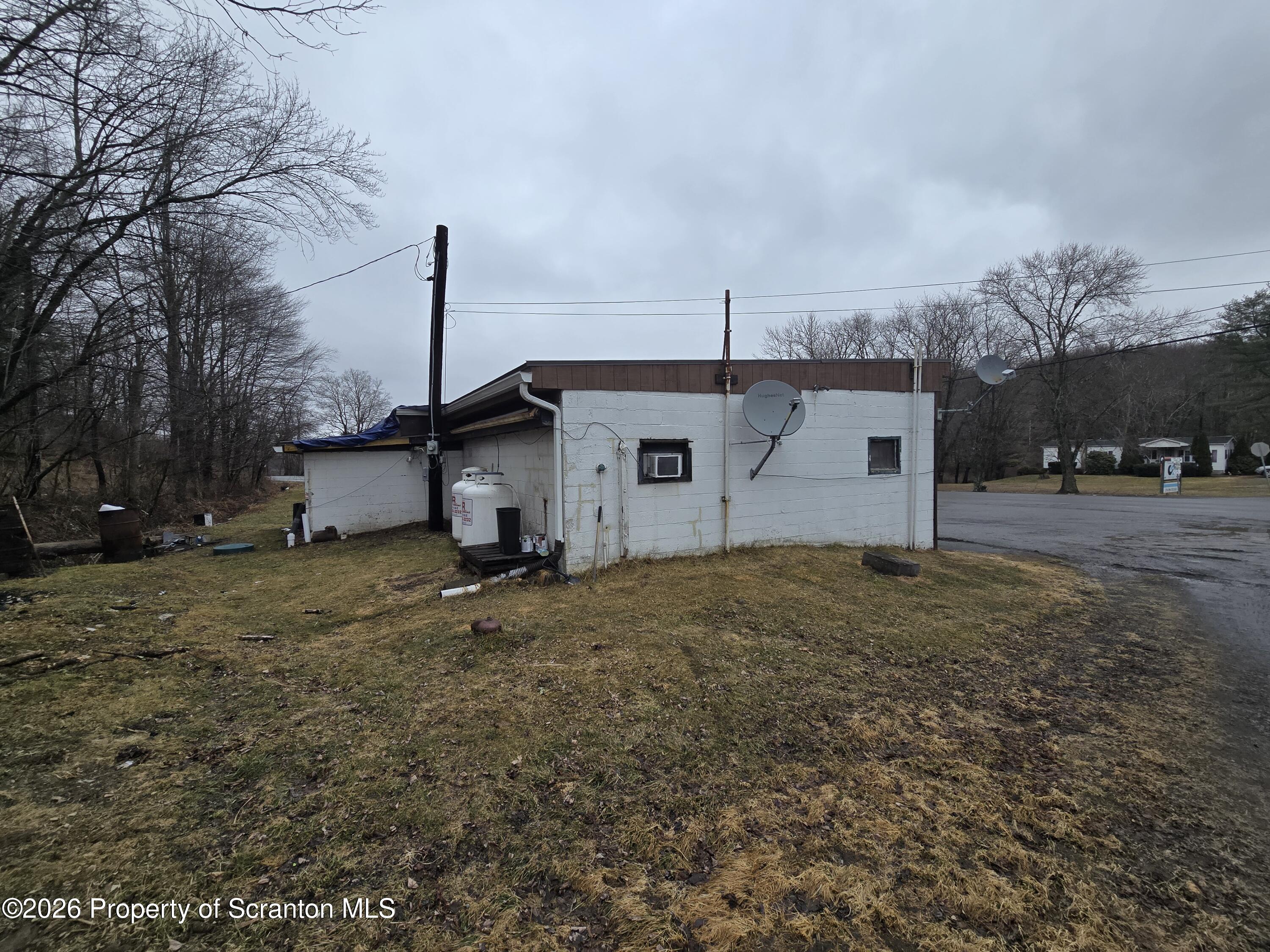 1025 Meshoppen Creek Road Tunkhannock, PA 18657 - Photo 4 of 24 a house view with a backyard space