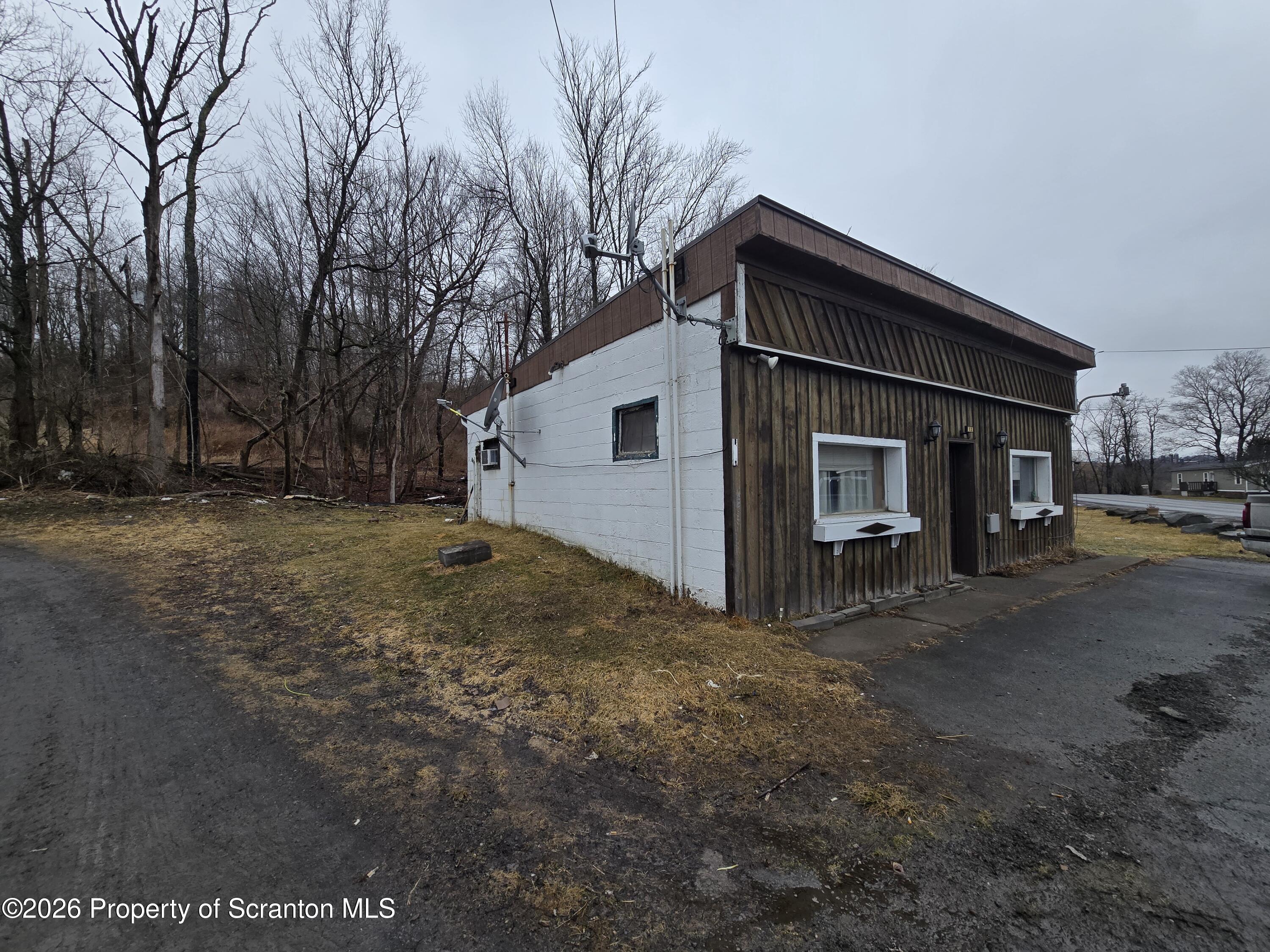 1025 Meshoppen Creek Road Tunkhannock, PA 18657 - Photo 5 of 24 a view of a house with a yard