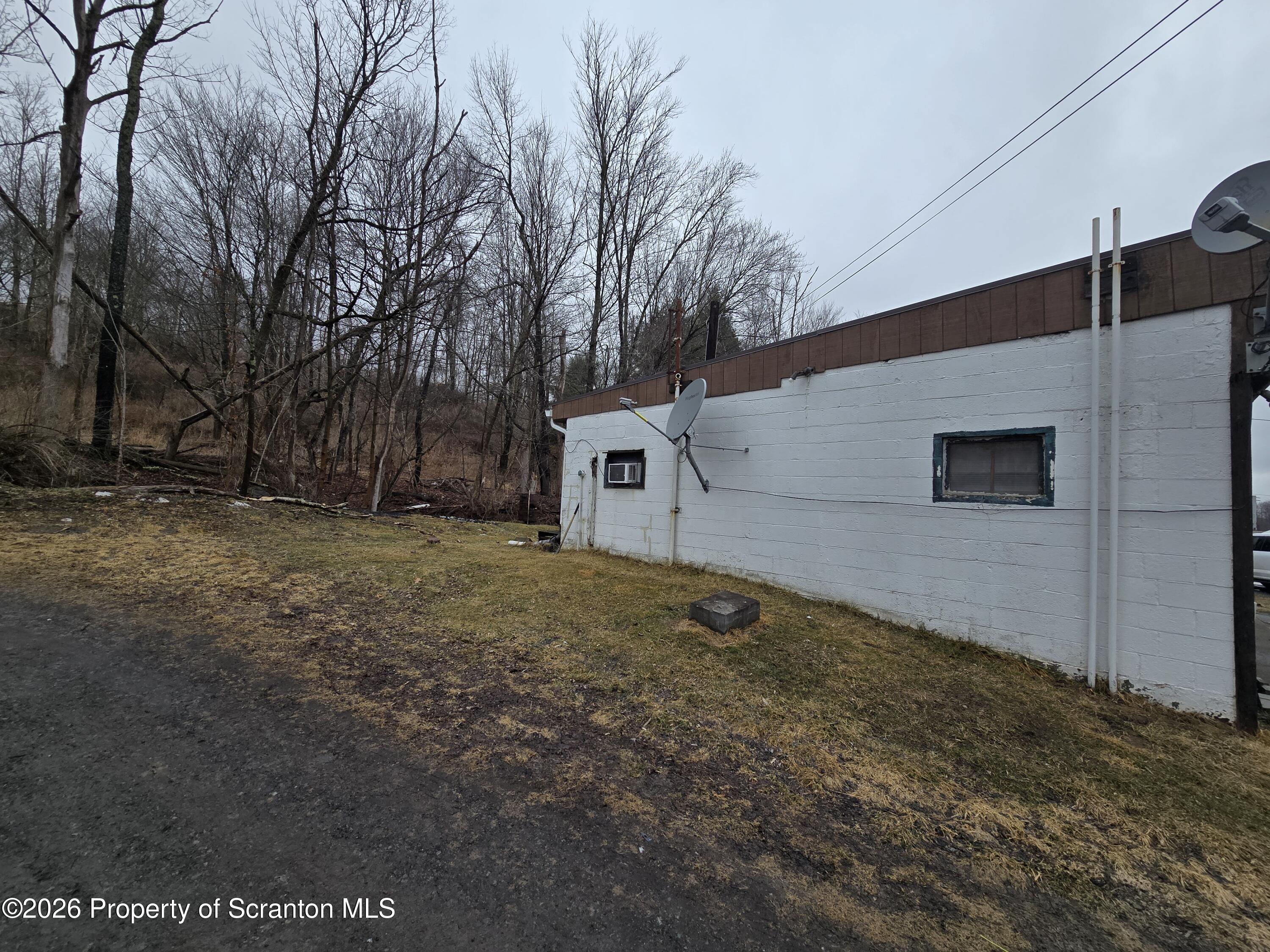 1025 Meshoppen Creek Road Tunkhannock, PA 18657 - Photo 7 of 24 a backyard of a house
