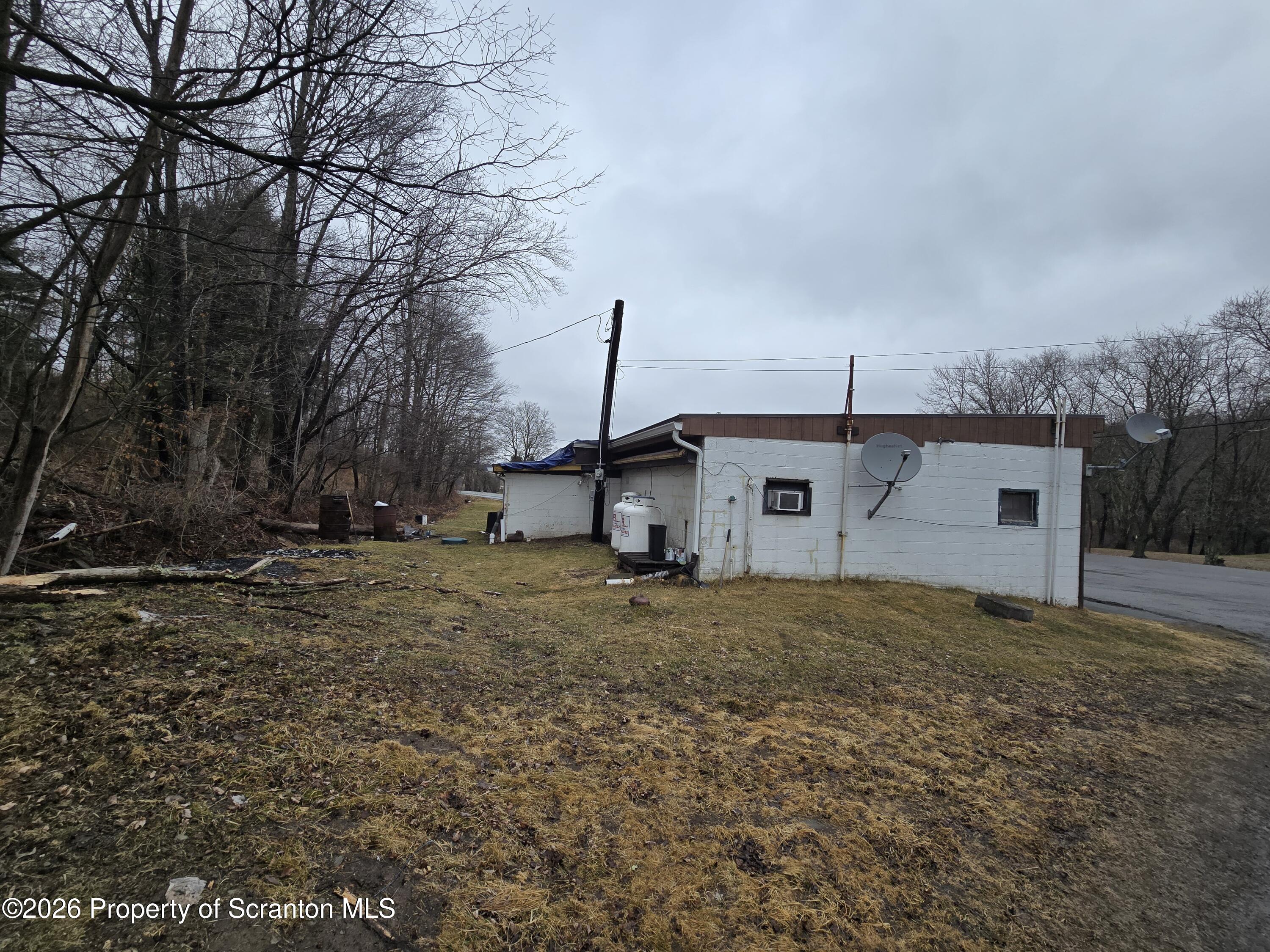 1025 Meshoppen Creek Road Tunkhannock, PA 18657 - Photo 8 of 24 a view of a house with a yard