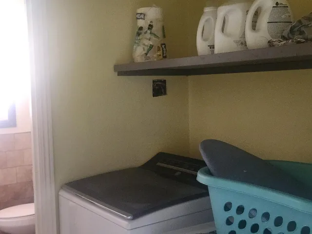 a workspace with furniture and wooden floor