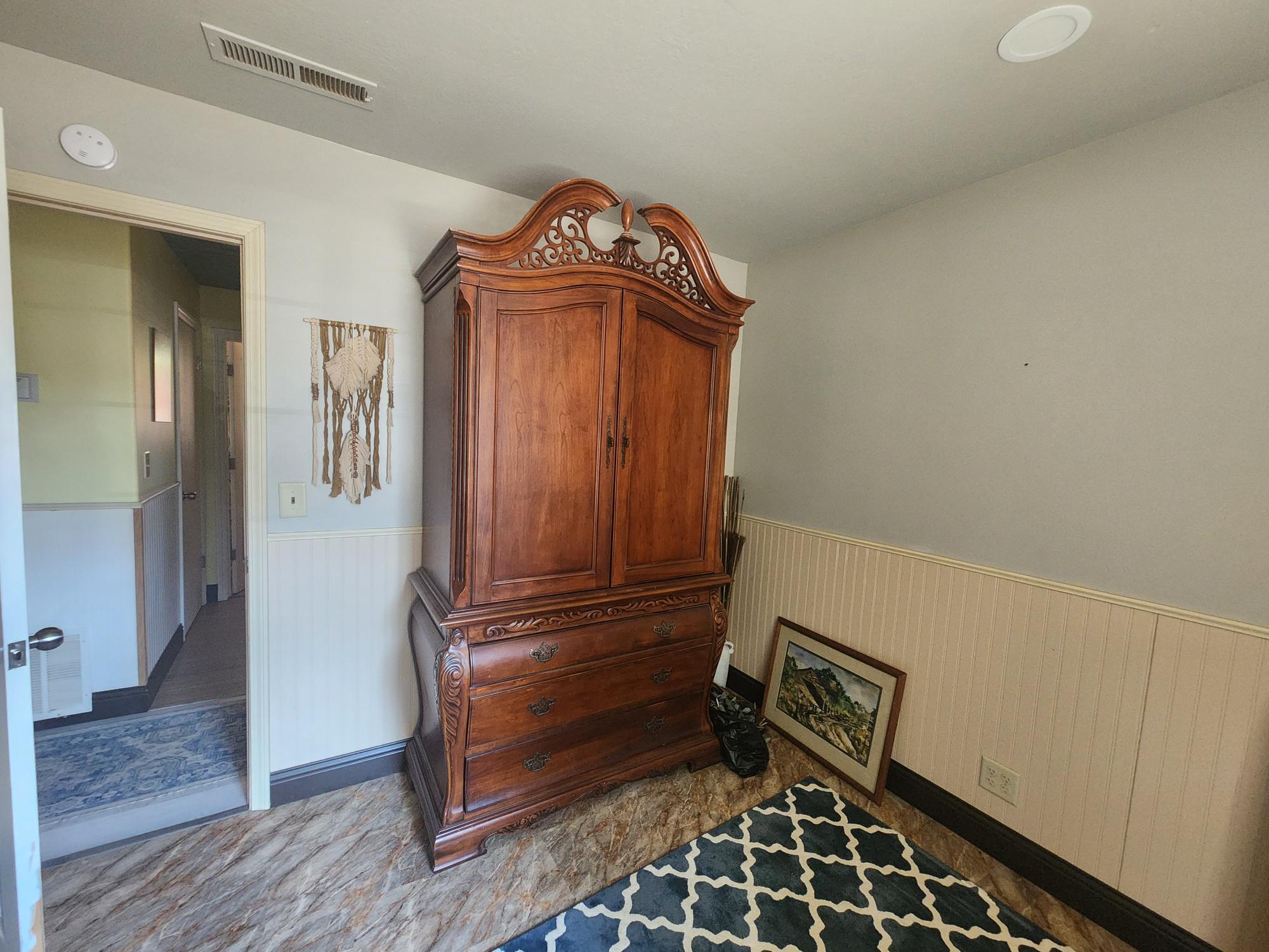 20263 Sugar Pine Street Burney, CA 96013 - Photo 19 of 22 a view of a hallway with wooden floor