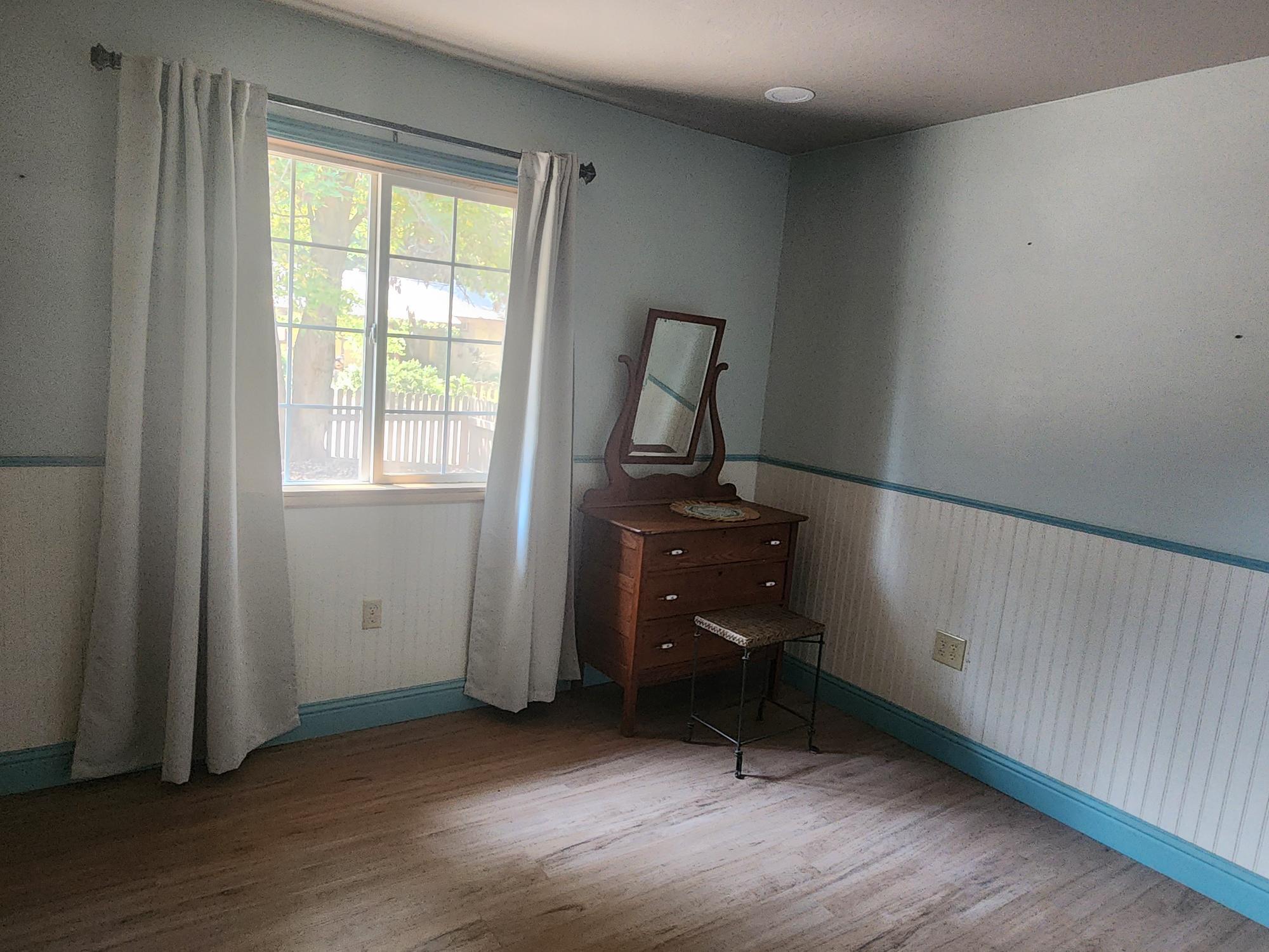 20263 Sugar Pine Street Burney, CA 96013 - Photo 20 of 22 an empty room with windows