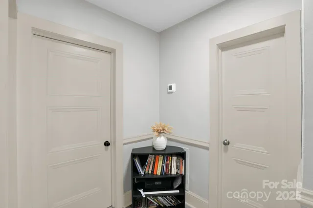 a view of a hallway with closet