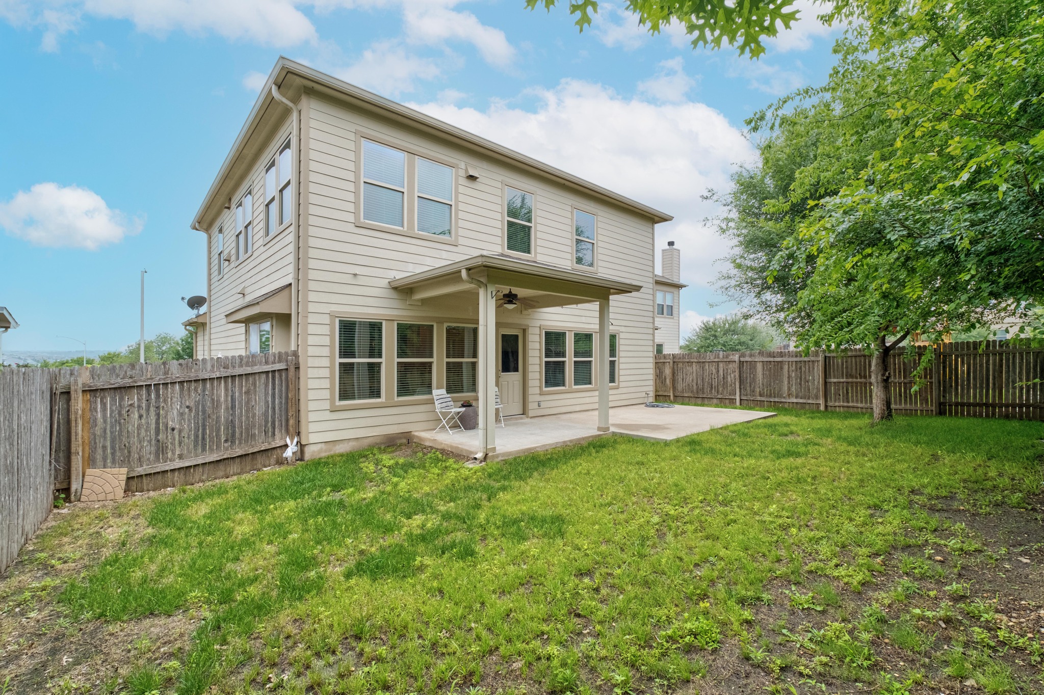 10124 Pinnacle Crest Loop Austin, TX 78747 - Photo 27 of 31 Two-story residence with a beige siding exterior