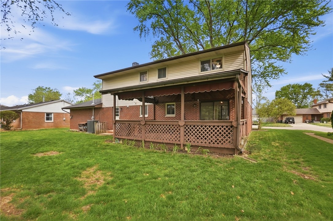 150 Littlejohn Road Troy, OH 45373 - Photo 38 of 40 This charming home offers a spacious private yard and a delightful covered patio perfect for outdoor enjoyment.