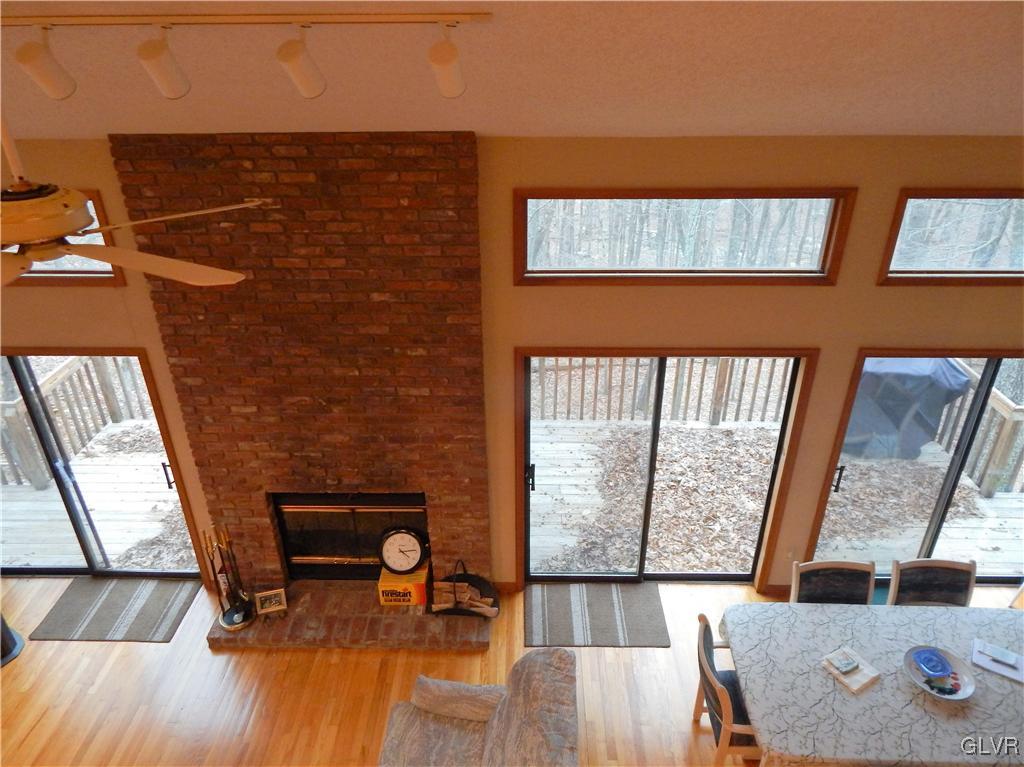 174 Radcliff Road Bushkill, PA 18324 - Photo 7 of 24 a view of a livingroom with furniture and staircase