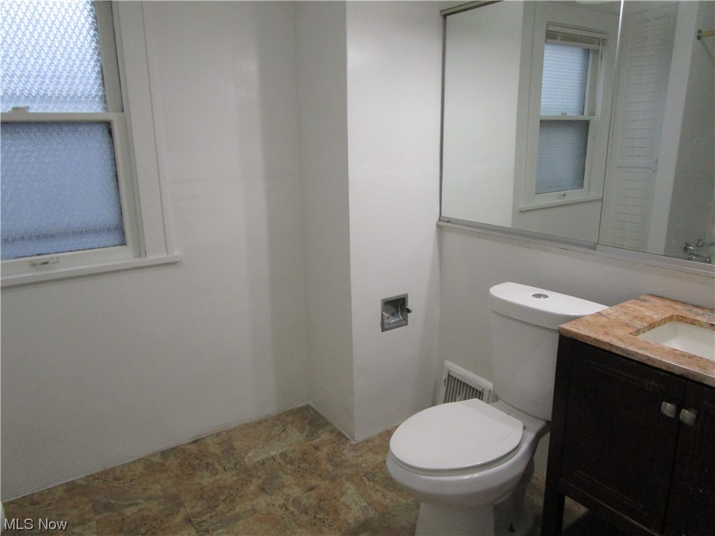 3796 Lowell Road Cleveland Heights, OH 44121 - Photo 8 of 11 Bathroom with toilet, tile flooring, and oversized vanity