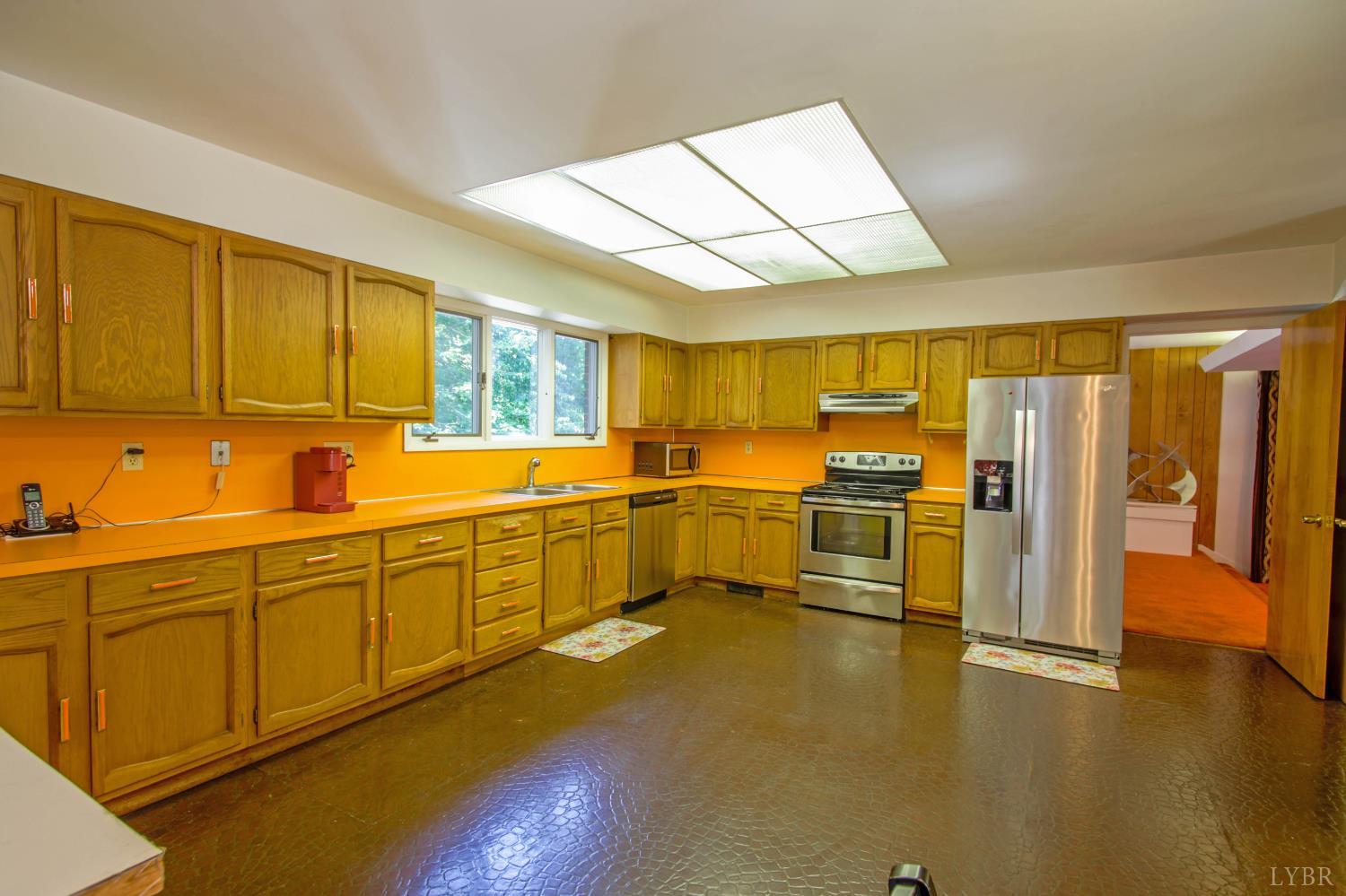 151 Clarks Road Rustburg, VA 24588 - Photo 15 of 81 a kitchen with sink cabinets and stainless steel appliances