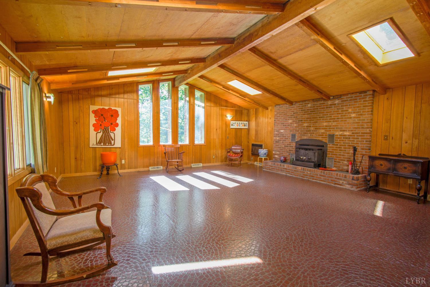151 Clarks Road Rustburg, VA 24588 - Photo 17 of 81 a view of a livingroom with furniture and a fireplace