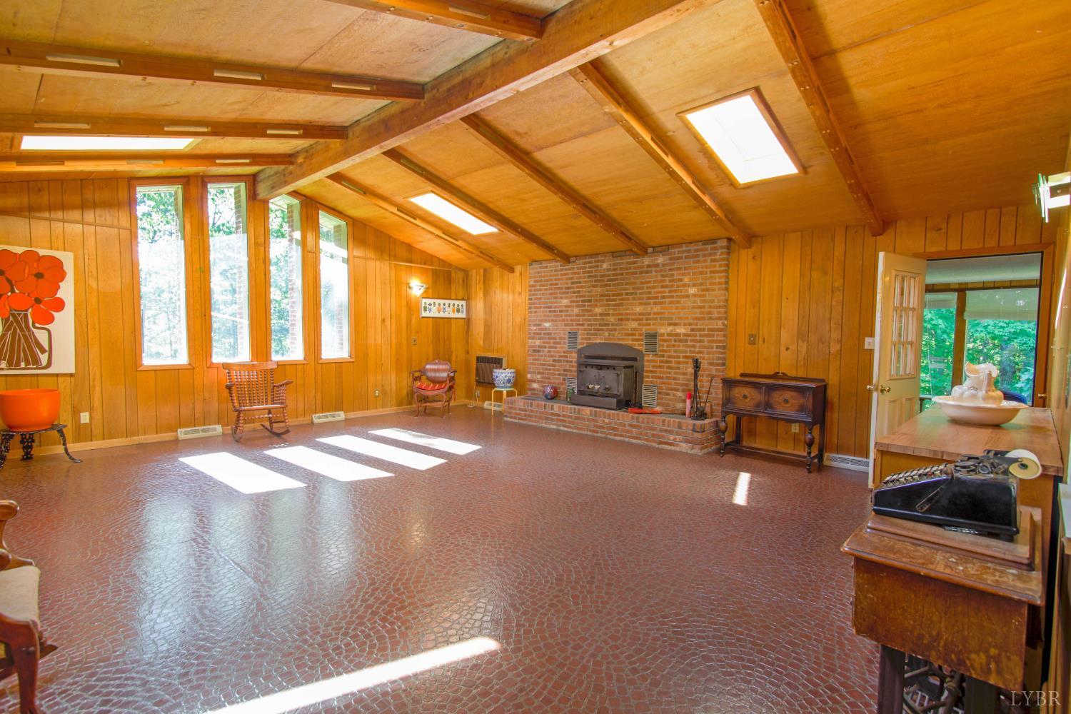 151 Clarks Road Rustburg, VA 24588 - Photo 18 of 81 a view of a livingroom with furniture and kitchen view