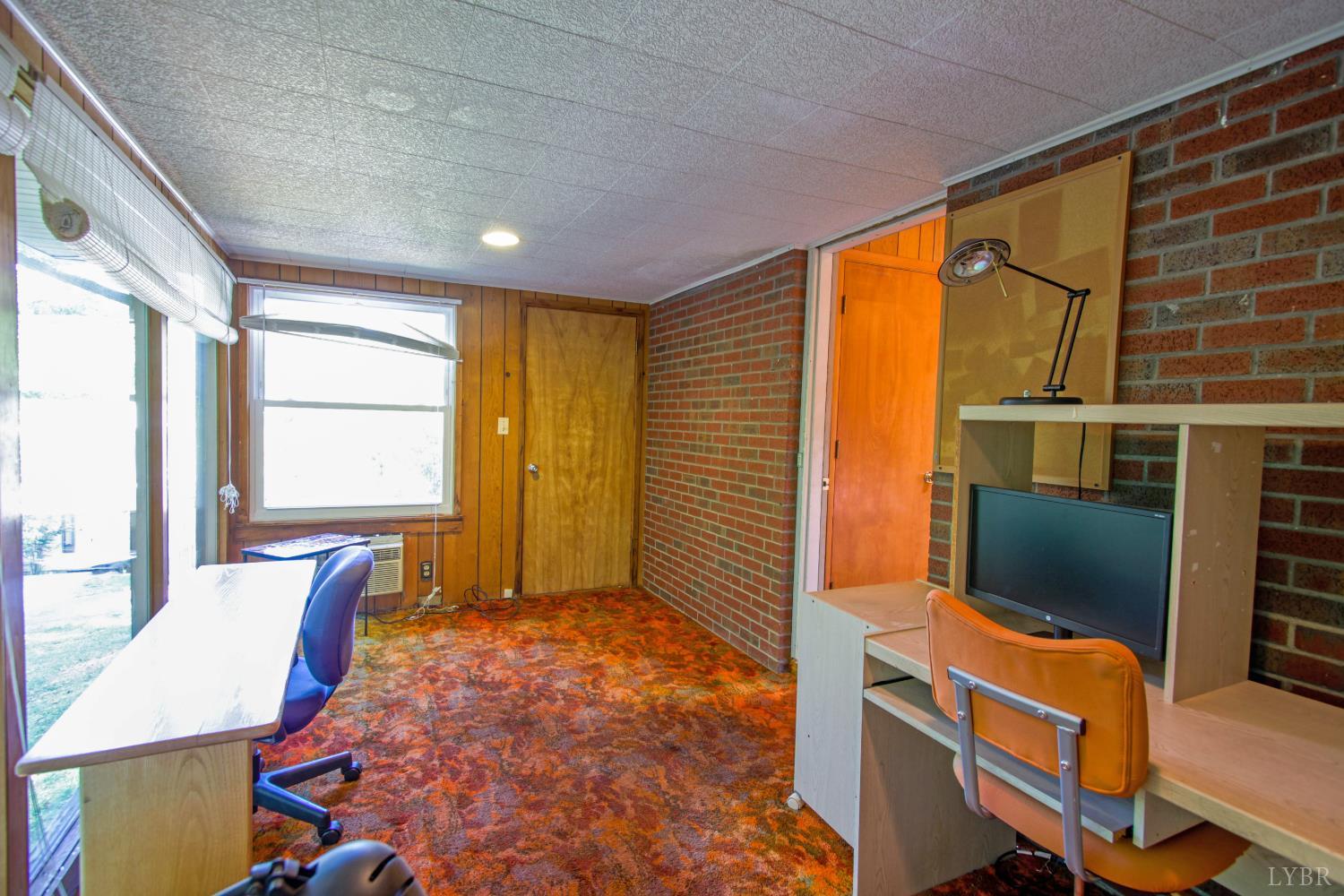 151 Clarks Road Rustburg, VA 24588 - Photo 24 of 81 a view of an empty room with a window
