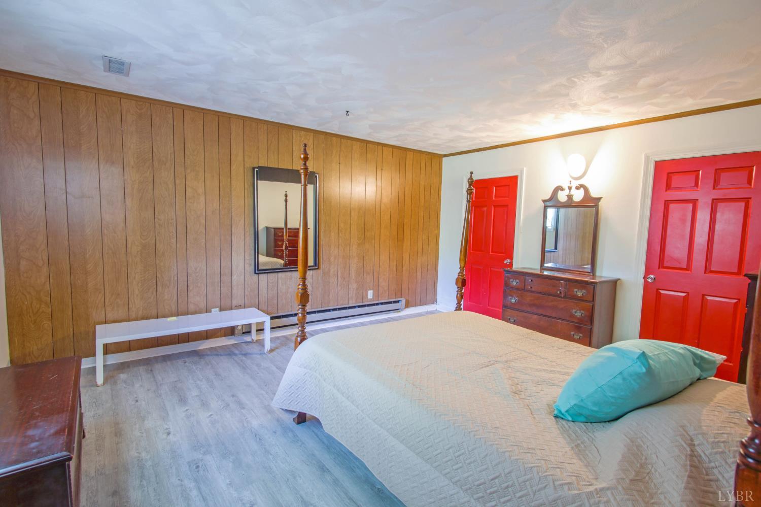 151 Clarks Road Rustburg, VA 24588 - Photo 54 of 81 a bedroom with a bed and a television