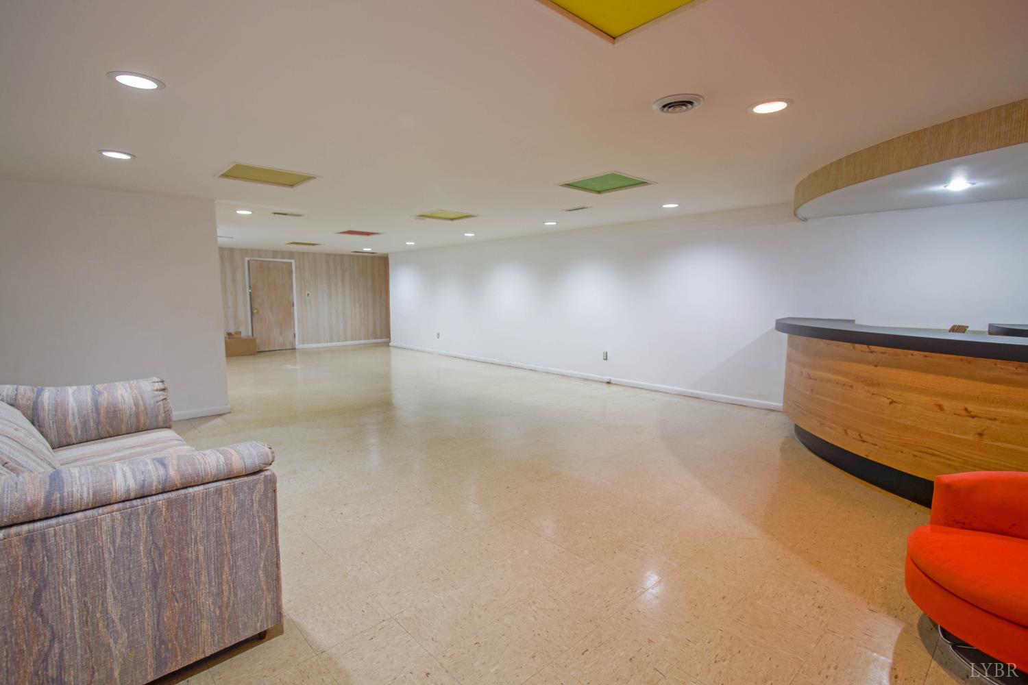 151 Clarks Road Rustburg, VA 24588 - Photo 61 of 81 a living room with furniture and a large window