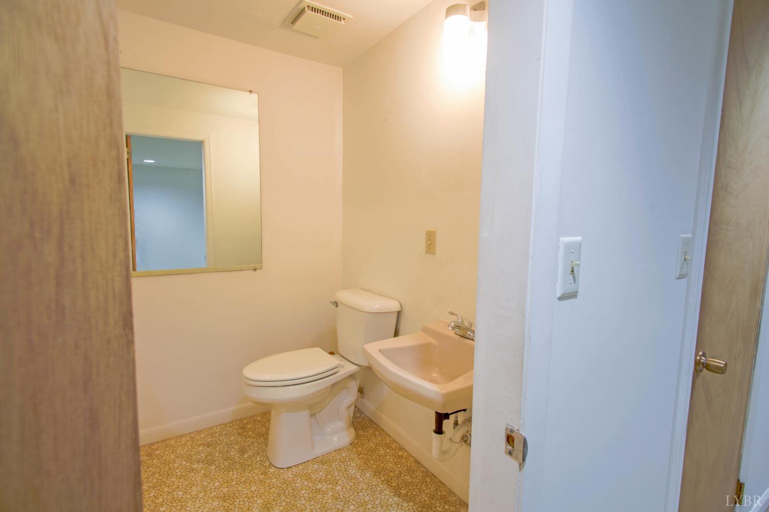 151 Clarks Road Rustburg, VA 24588 - Photo 63 of 81 a bathroom with a toilet and a sink