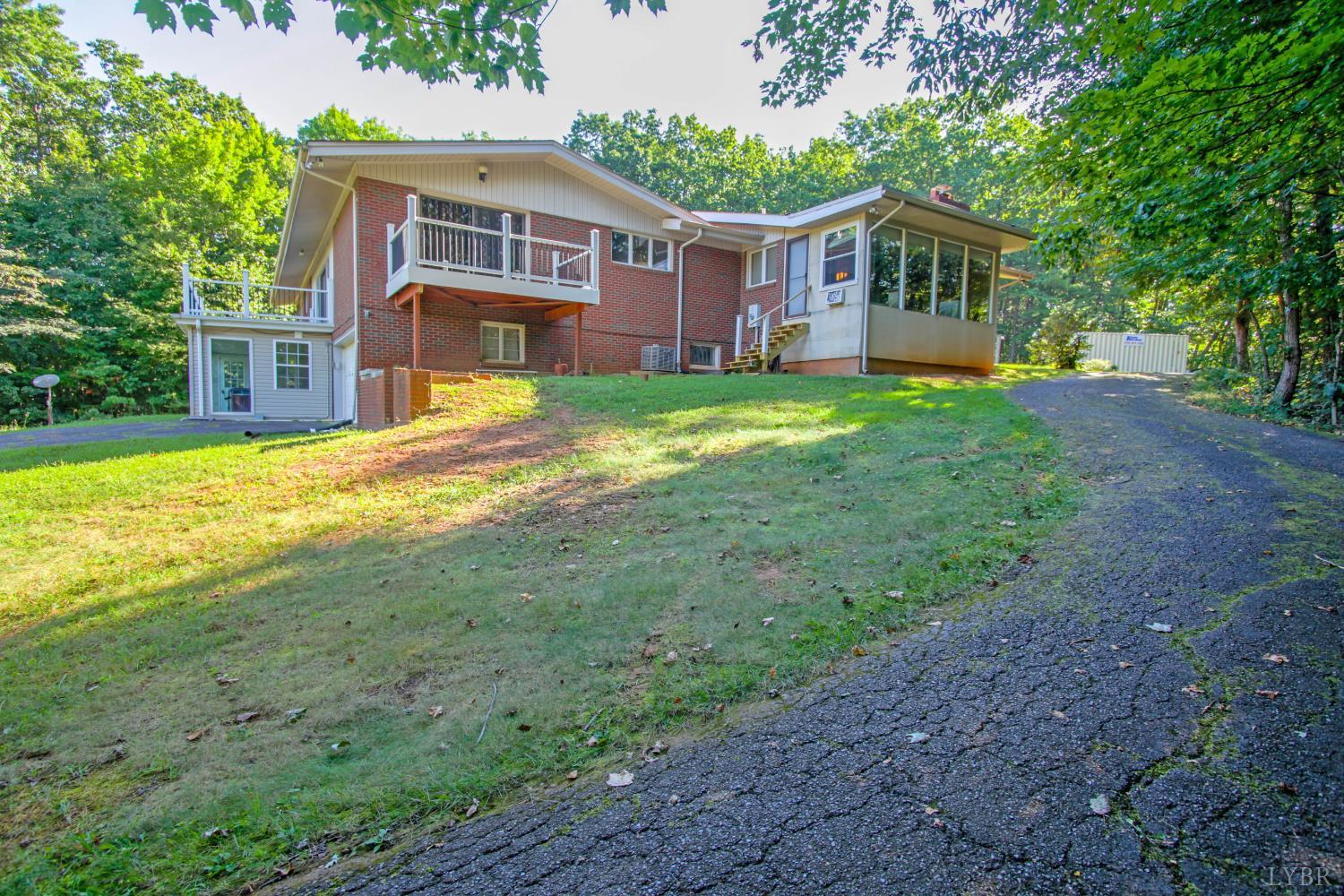 151 Clarks Road Rustburg, VA 24588 - Photo 74 of 81 a front view of a house with yard and green space