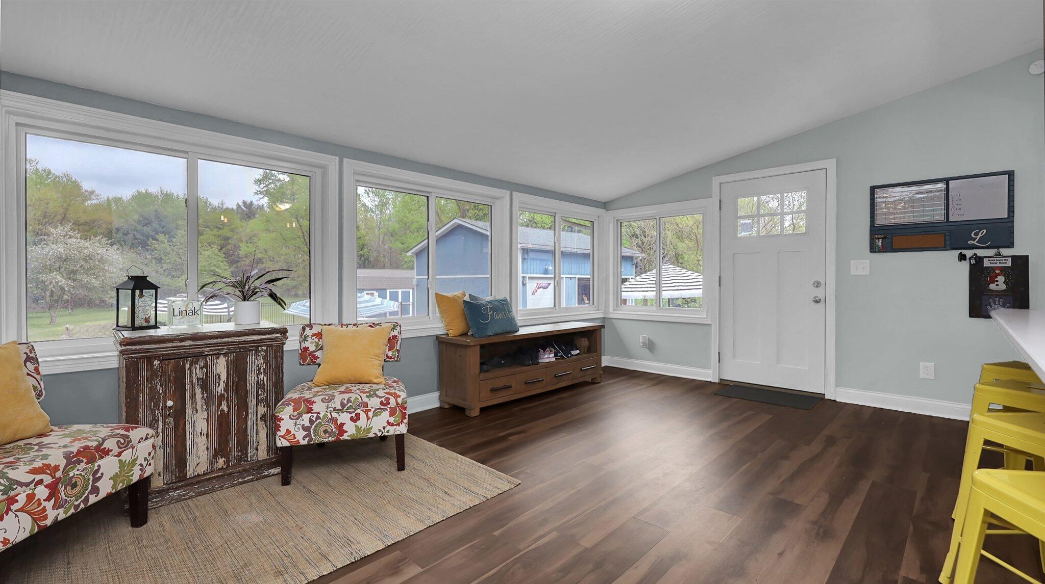 7790 Schott Road Westerville, OH 43081 - Photo 15 of 50 Spanning almost the entire rear of the home is a GREAT room! With views of the backyard and pool, you'll enjoy spending your days in this space FULL of light!