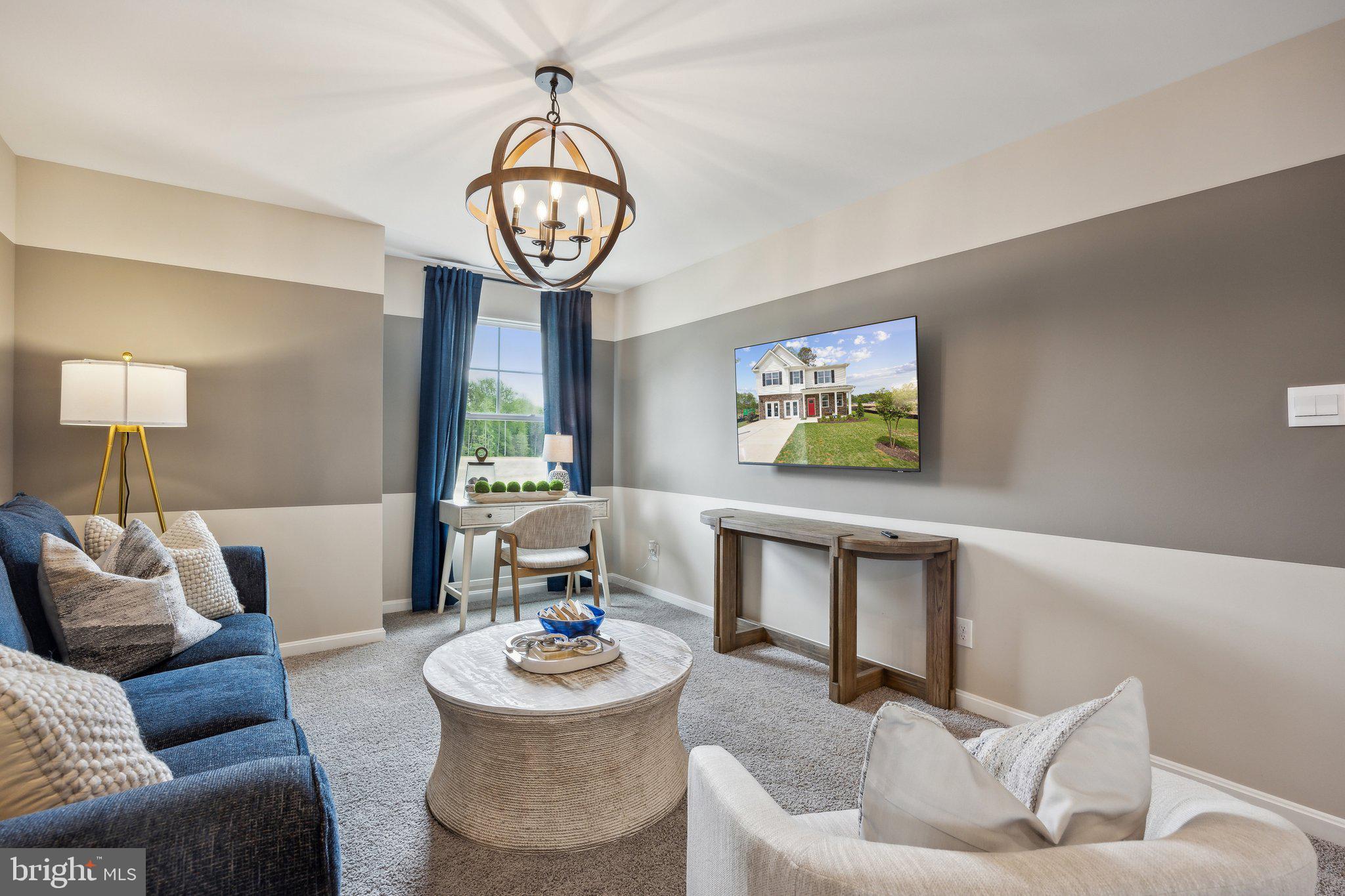 6292 Sterling Way Ruther Glen, VA 22546 - Photo 16 of 31 a living room with furniture and a large window