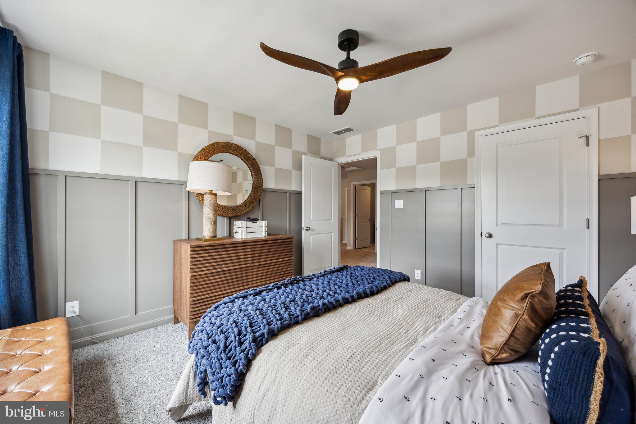 6292 Sterling Way Ruther Glen, VA 22546 - Photo 19 of 31 a bedroom with a bed and a dresser