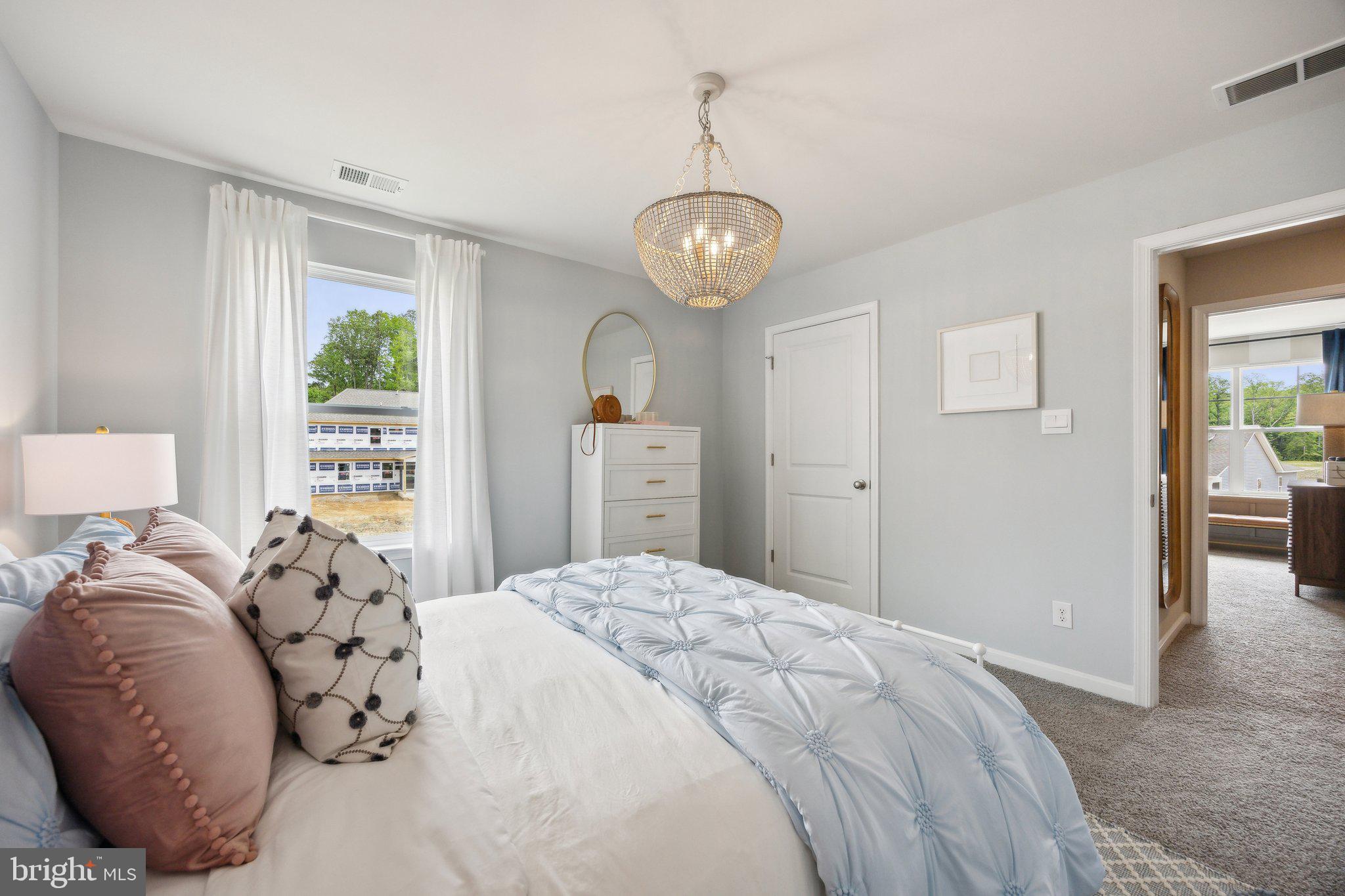 6292 Sterling Way Ruther Glen, VA 22546 - Photo 21 of 31 a bedroom with a large bed and a window