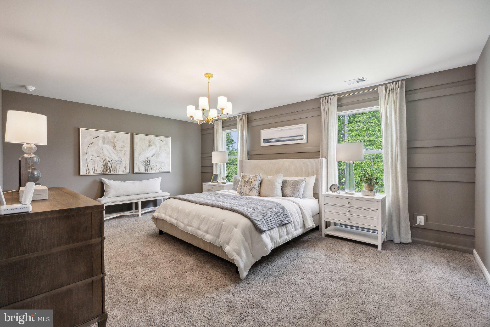 6292 Sterling Way Ruther Glen, VA 22546 - Photo 25 of 31 a spacious bedroom with a bed and window