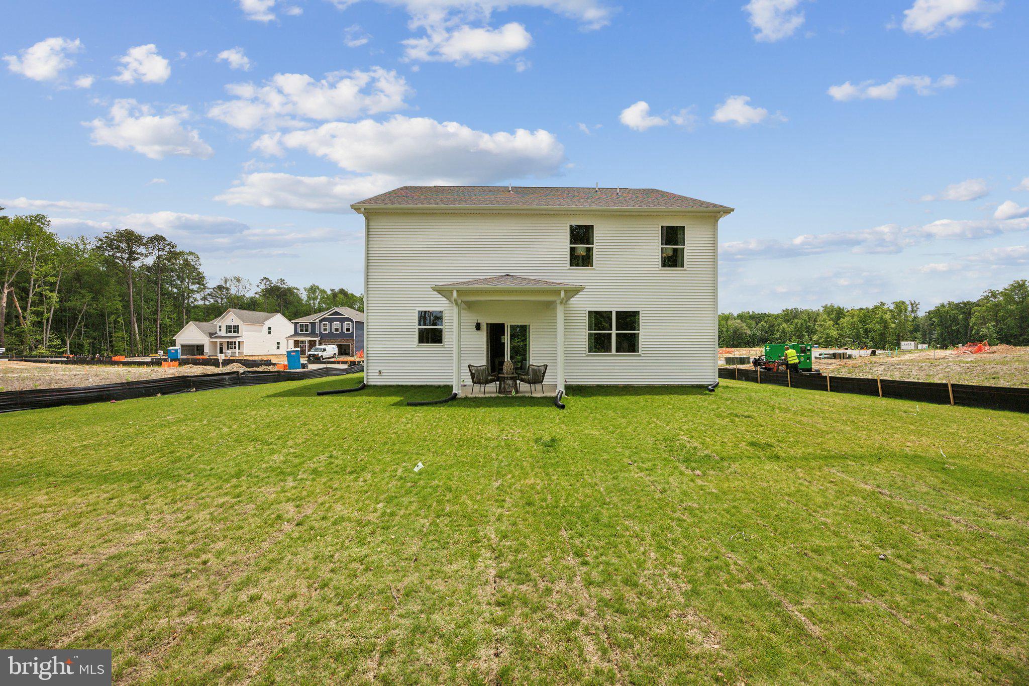 6292 Sterling Way Ruther Glen, VA 22546 - Photo 31 of 31 a view of a house with backyard and garden