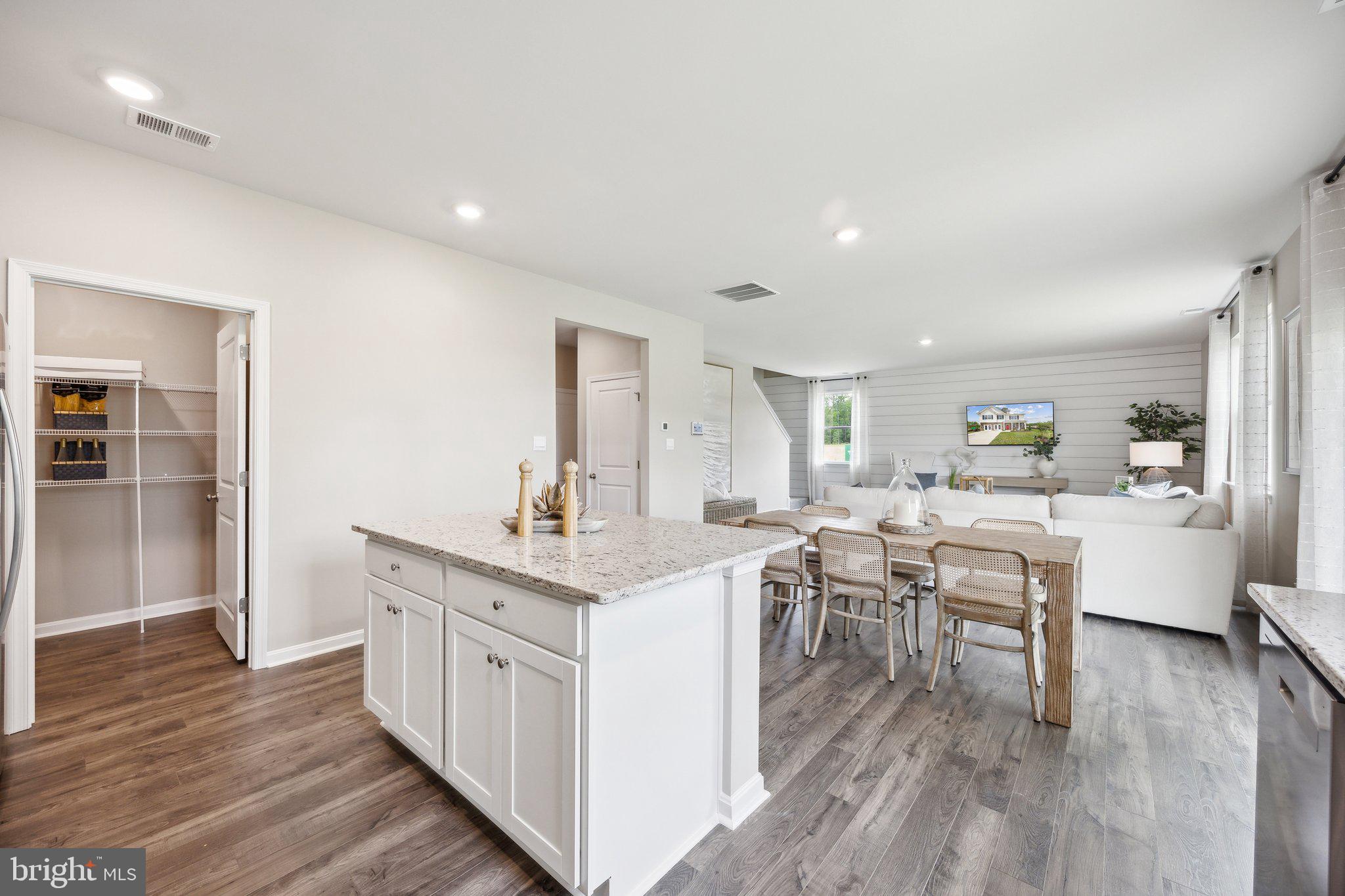 6292 Sterling Way Ruther Glen, VA 22546 - Photo 7 of 31 a kitchen with a sink cabinets and wooden floor