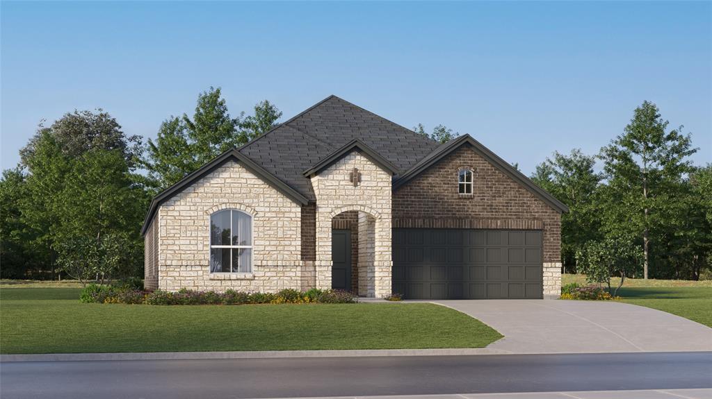 French country style house featuring stone siding, a front yard, concrete driveway, and a garage