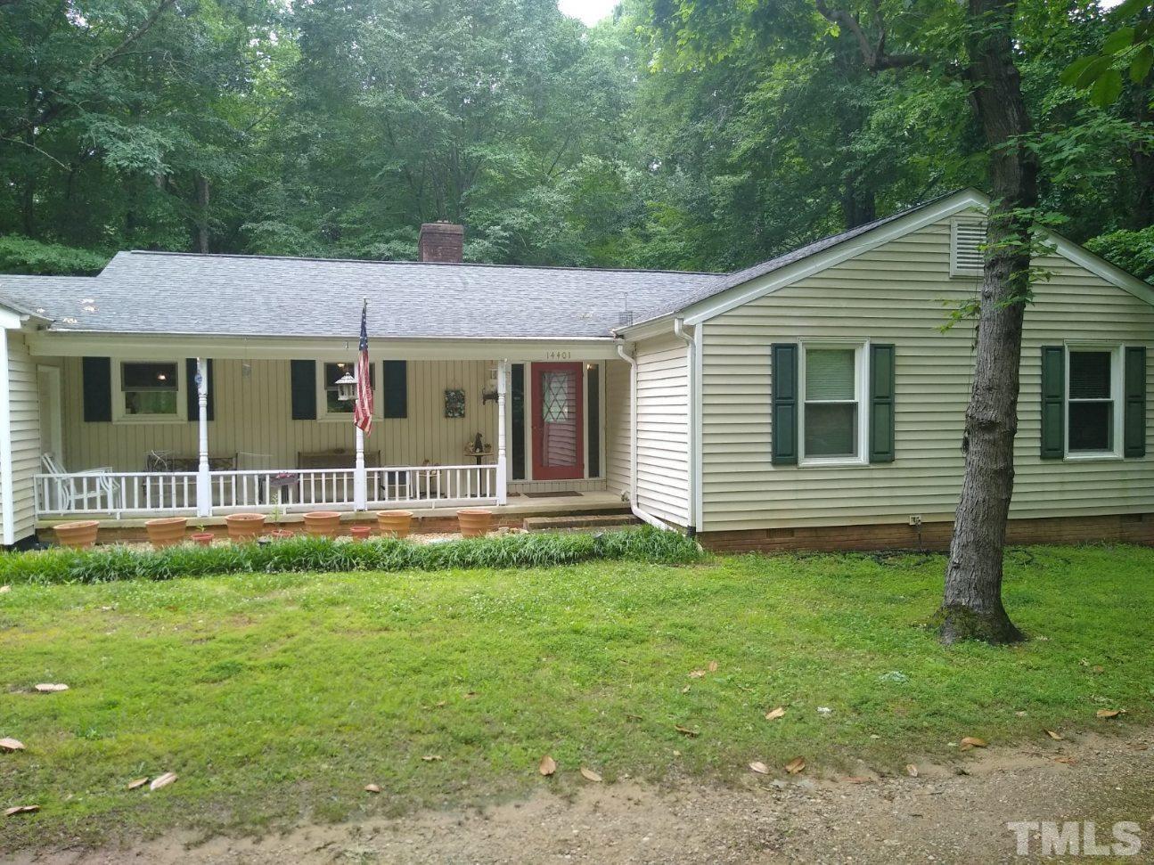 a view of a house that has a garden