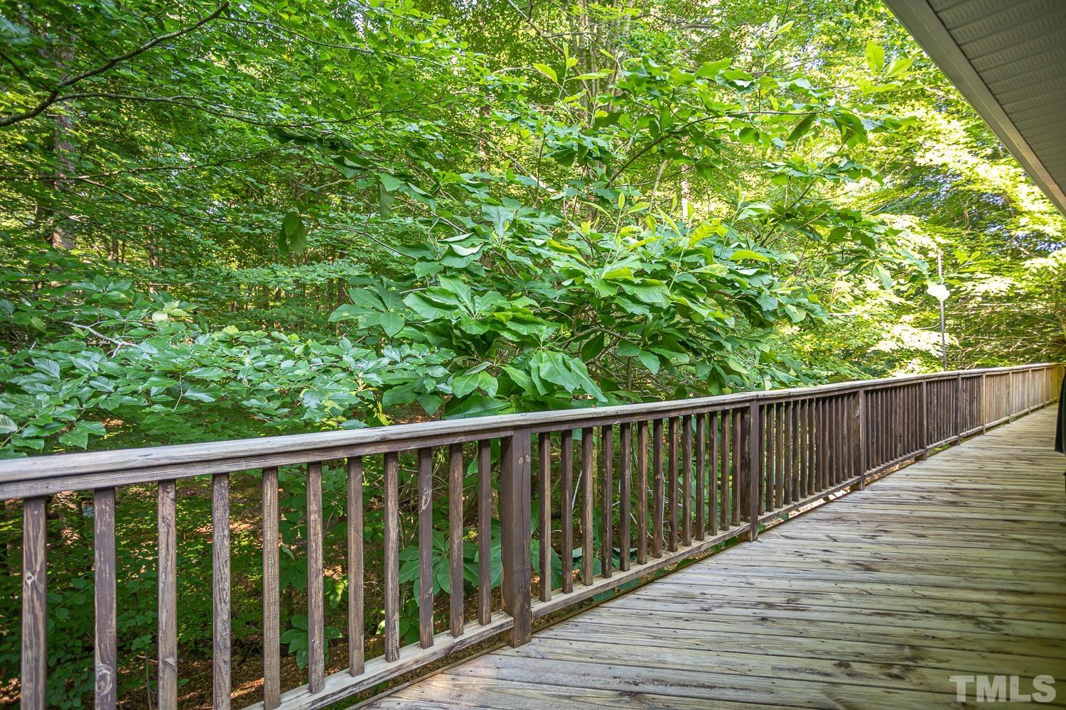14401 Possum Track Road Raleigh, NC 27614 - Photo 26 of 30 a balcony with wooden fence