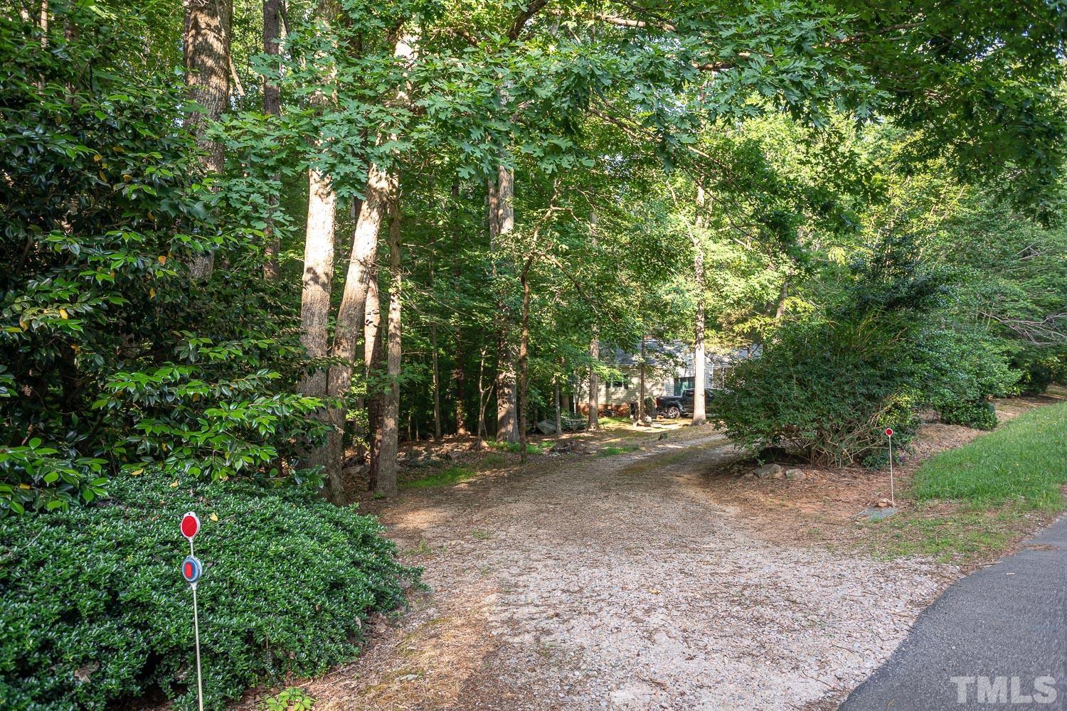 14401 Possum Track Road Raleigh, NC 27614 - Photo 28 of 30 a view of a tree in front of a house