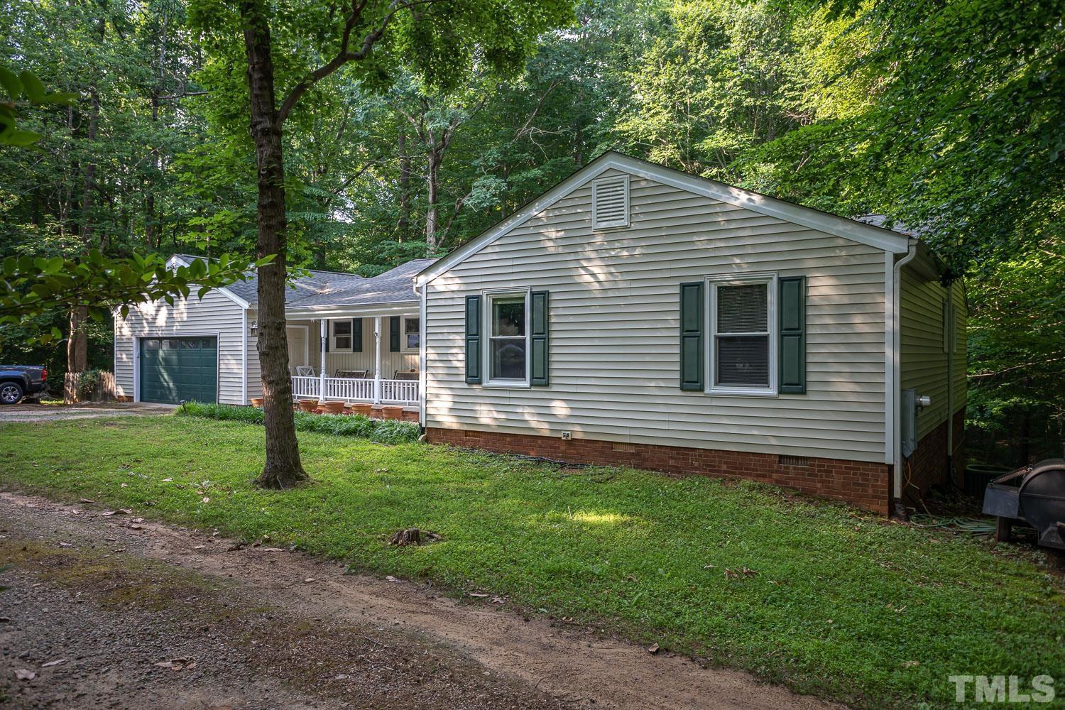 14401 Possum Track Road Raleigh, NC 27614 - Photo 29 of 30 a view of a house with a yard