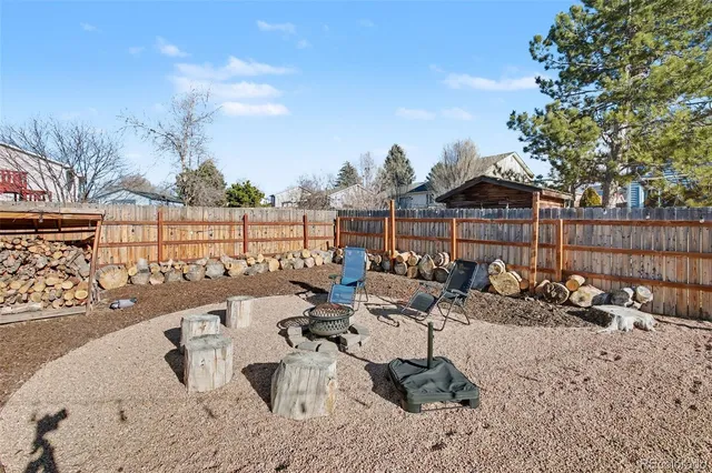 a view of roof deck with patio