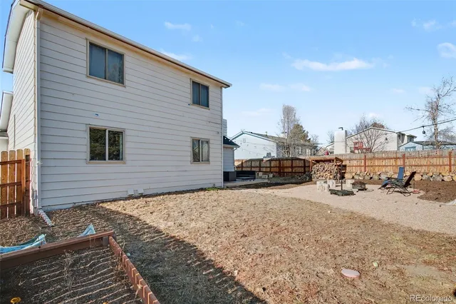 a view of a terrace with a barbeque