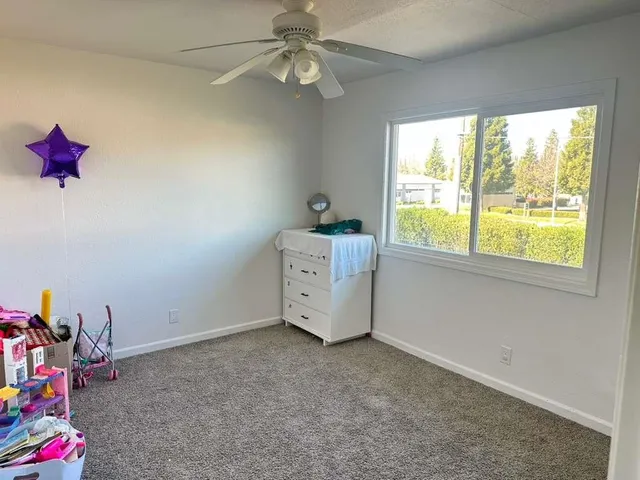 a view of hallway with a window