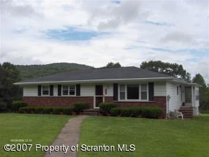 312 School House Road Tunkhannock, PA 18657 - Photo 1 of 1 front view of a house with a yard