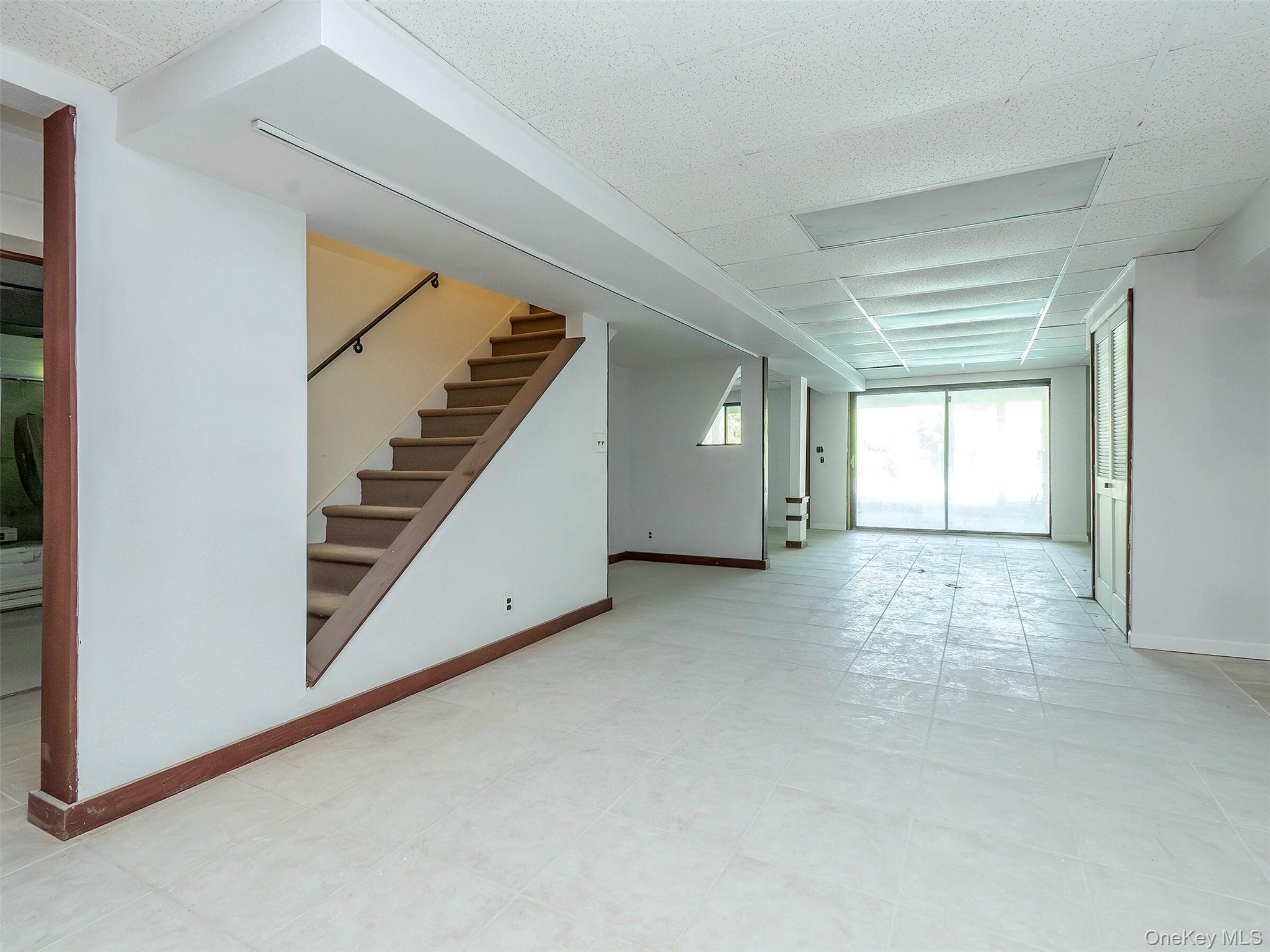 32 Carriage Road Great Neck, NY 11024 - Photo 24 of 33 an empty room with windows