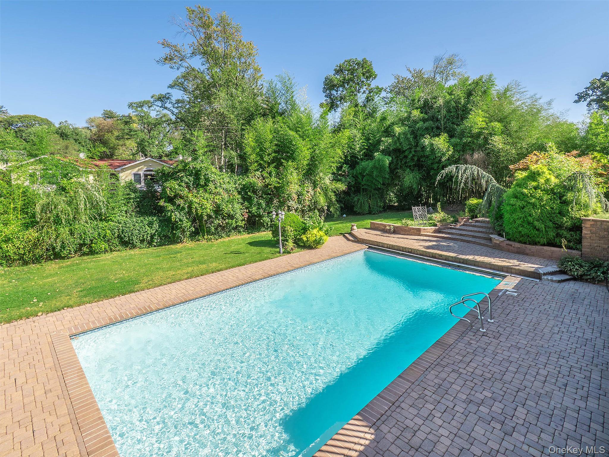 32 Carriage Road Great Neck, NY 11024 - Photo 27 of 33 a view of a park with large trees