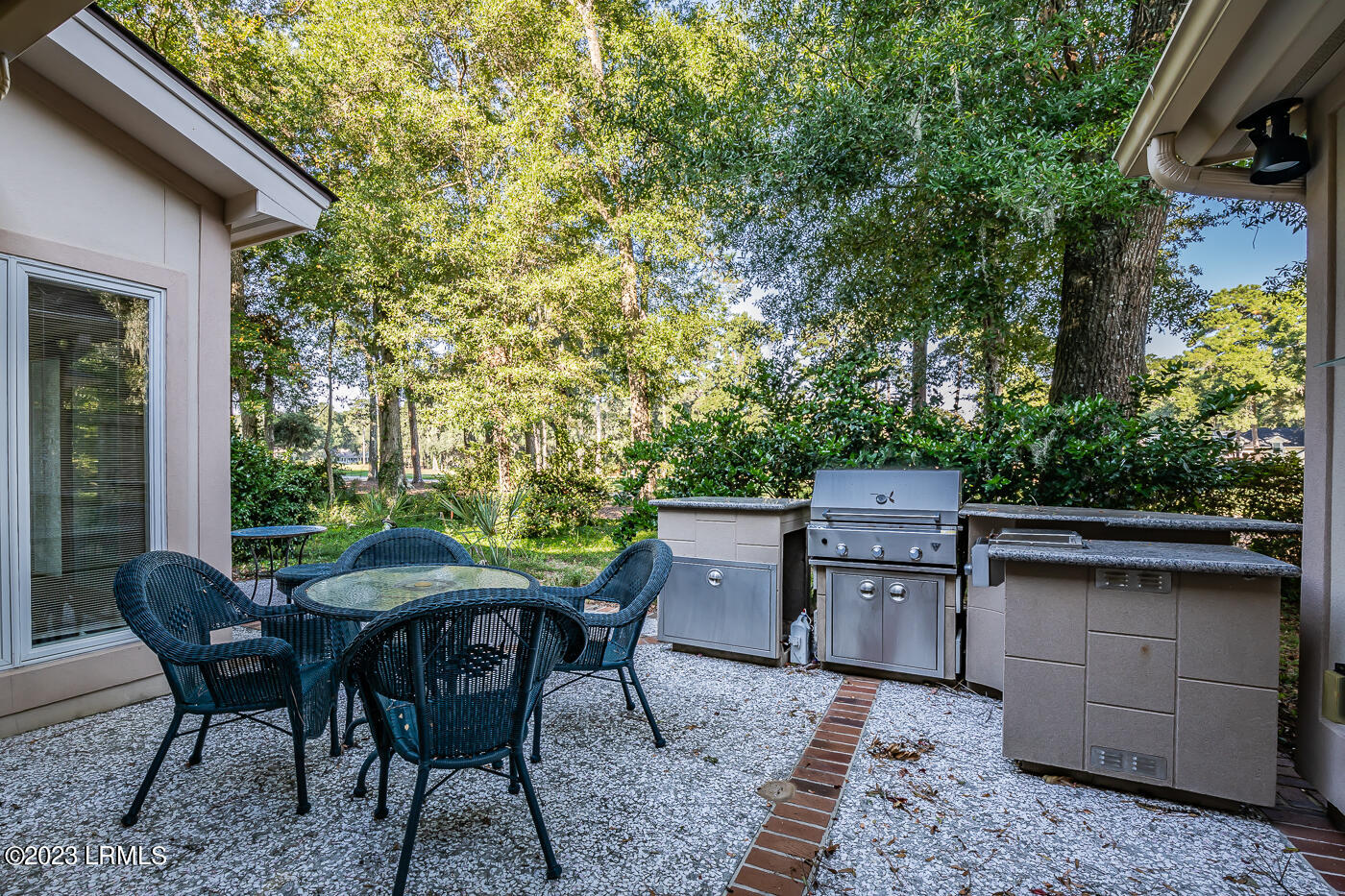128 Locust Fence Road St. Helena Island, SC 29920 - Photo 3 of 15 3 Patio and outdoor kitchen