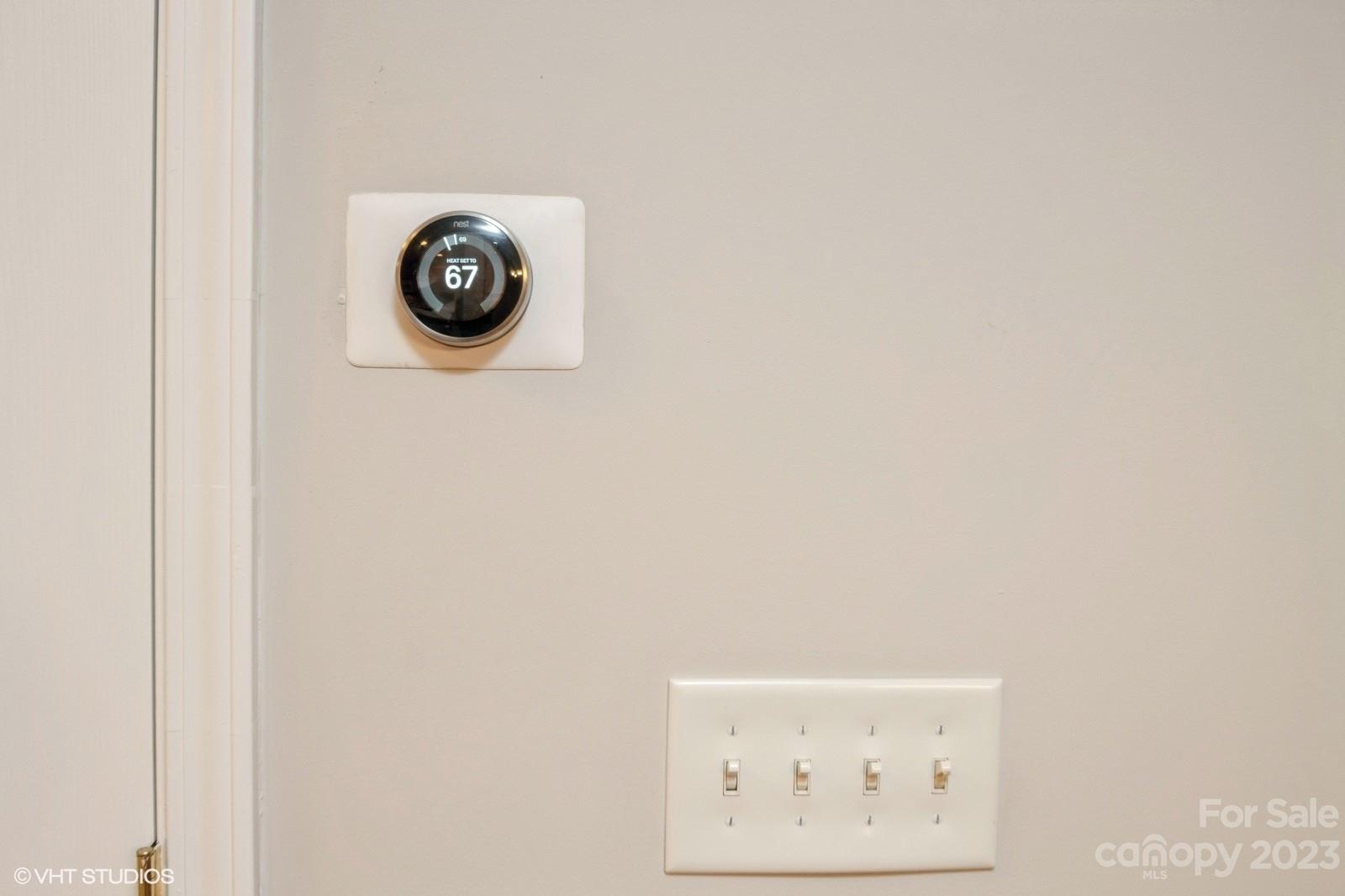 8334 Rudolph Road Charlotte, NC 28216 - Photo 13 of 31 a close up of a wall with a clock on it