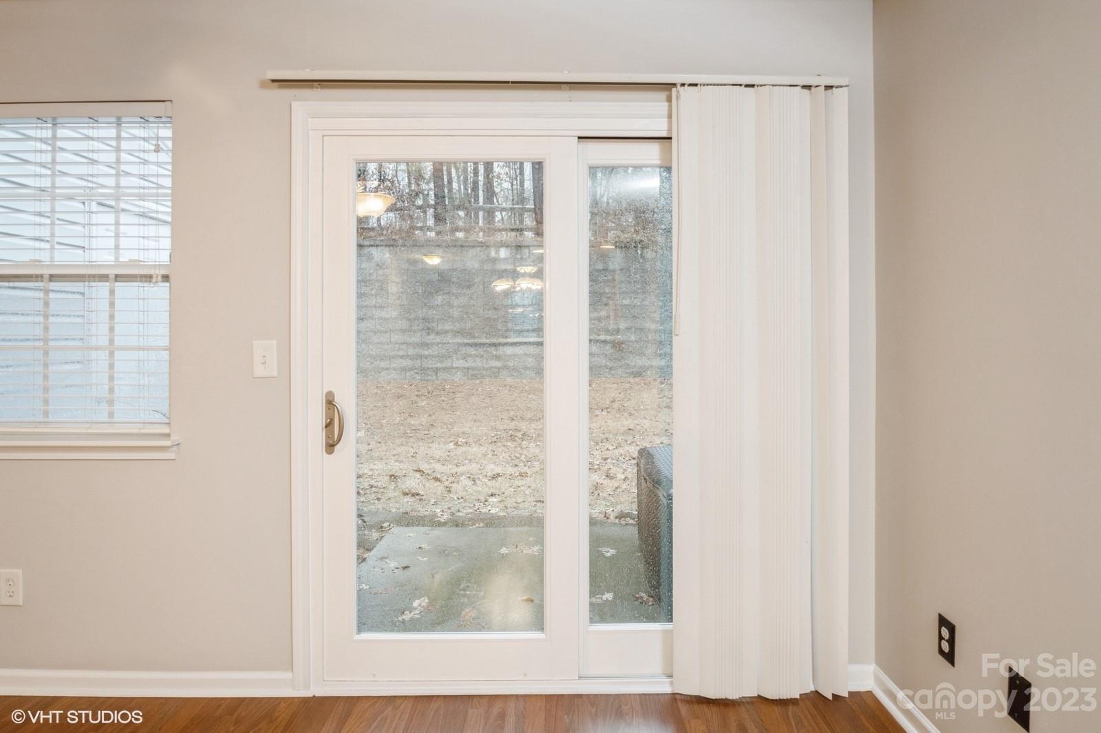 8334 Rudolph Road Charlotte, NC 28216 - Photo 10 of 31 a view of a bathroom with a glass door
