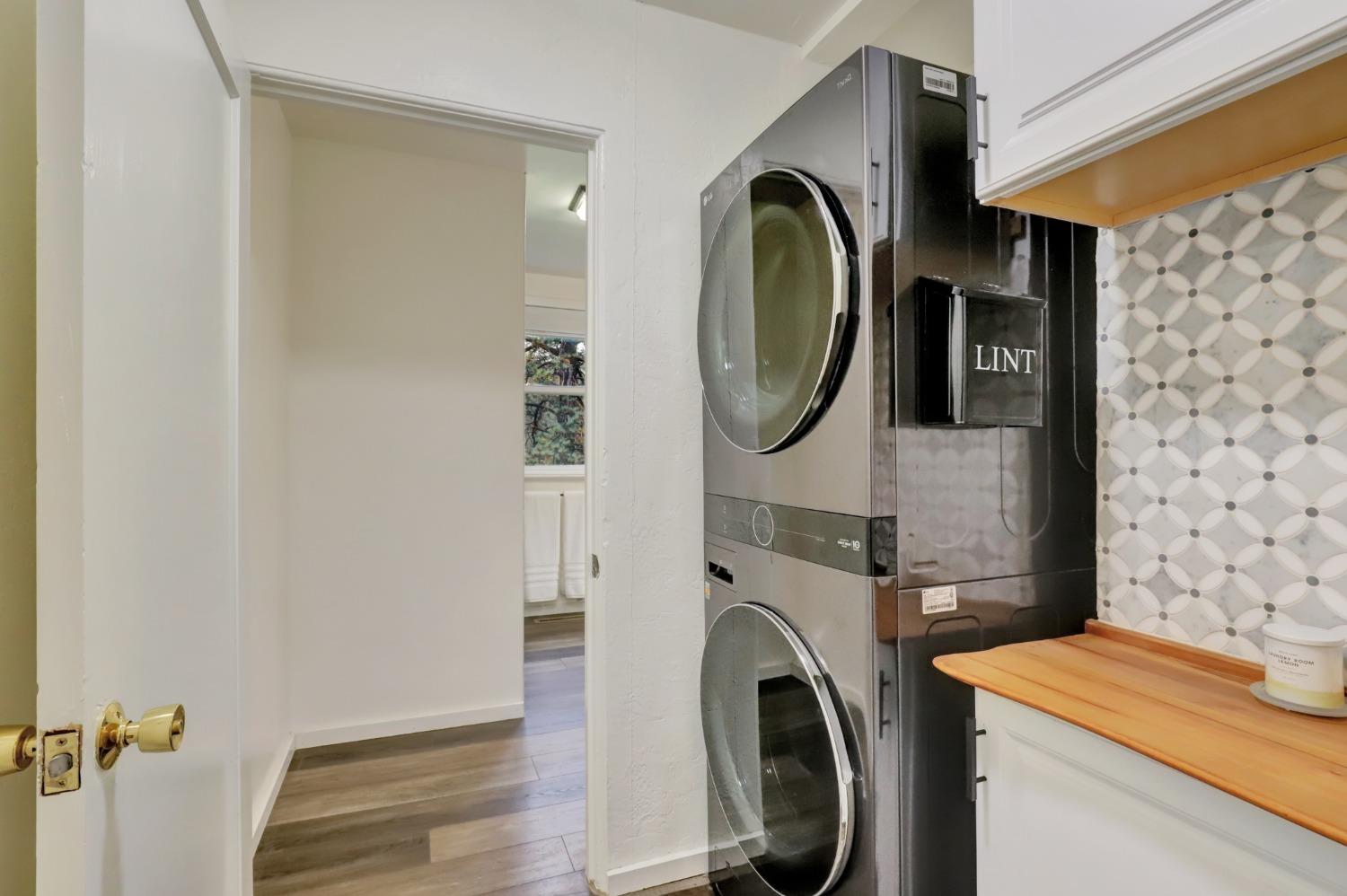 11625 Tyler Foote Road Nevada City, CA 95959 - Photo 16 of 96 a view of a storage and utility room with washer and dryer