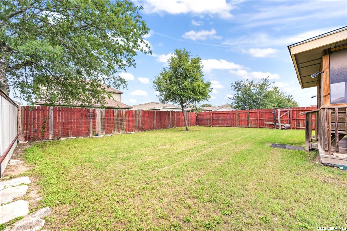 3831 Bacall Way Converse, TX 78109 - Photo 29 of 33 a view of yard with trees in the background