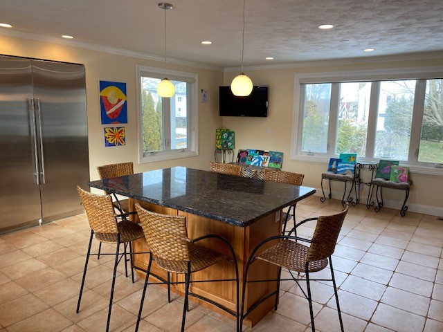 72 Weekapaug Road Westerly, RI 02891 - Photo 8 of 48 Gourmet EIK w/ High-End SS Appliances, Granite Counters & Island and Extra Sitting Area.