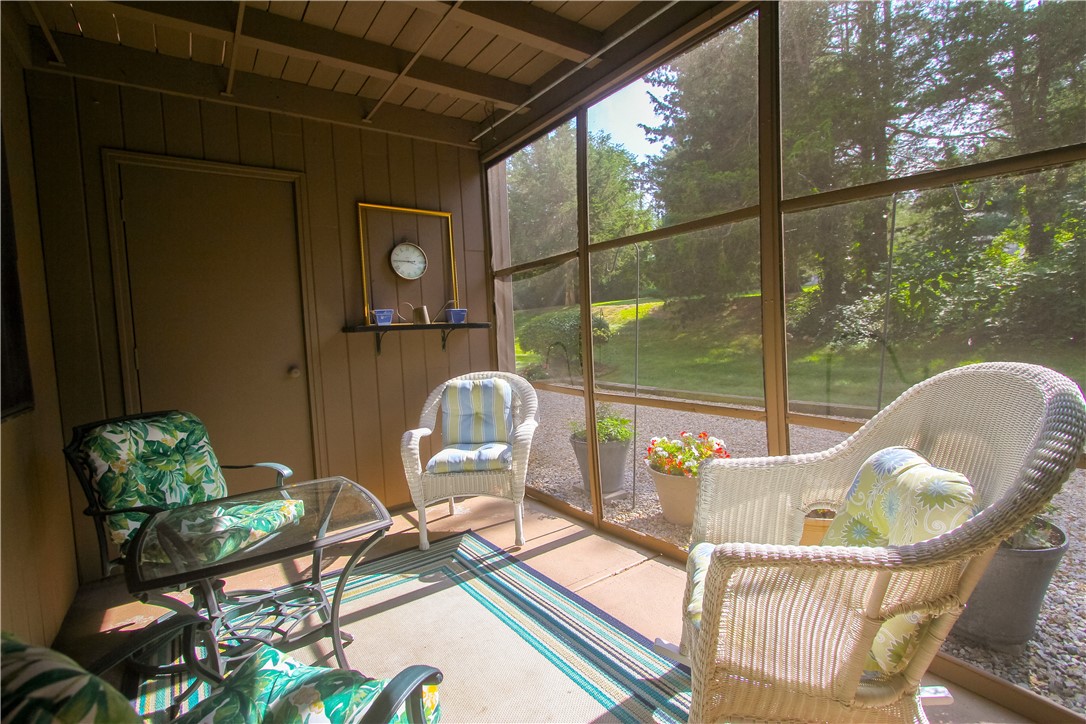 196 Old River Road, Unit 137 Lincoln, RI 02865 - Photo 18 of 21 A screened covered outdoor area provides a quiet outdoor space.