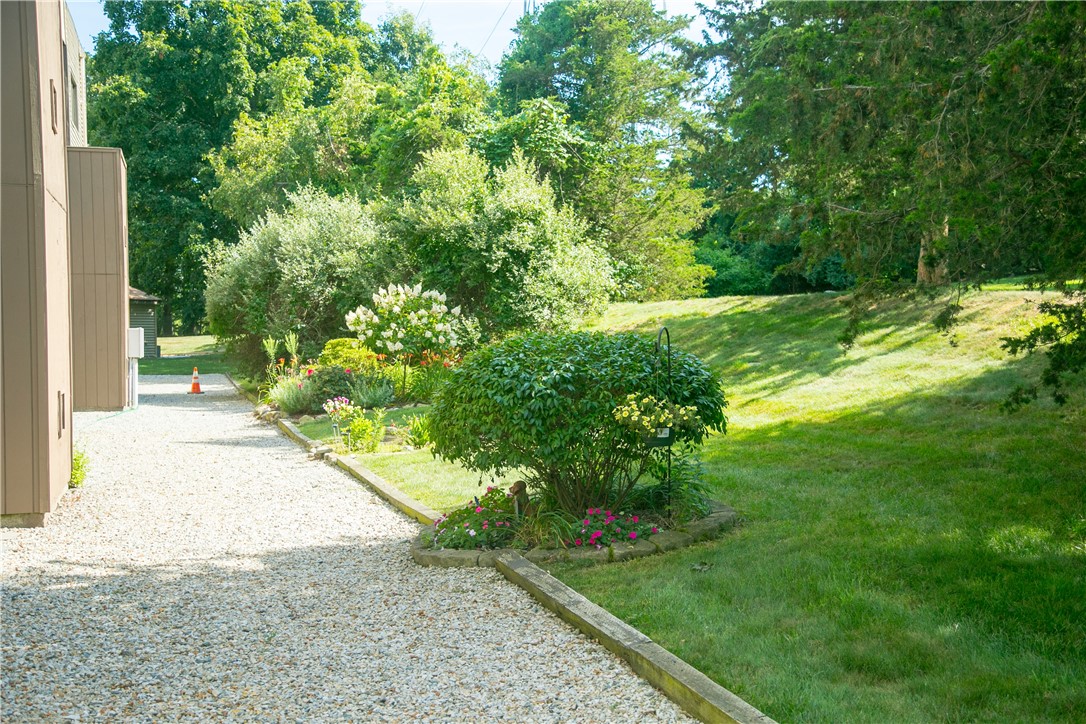 196 Old River Road, Unit 137 Lincoln, RI 02865 - Photo 20 of 21 Kirbrae Glen provides a lot of green space outside the units providing a quiet green refuge.