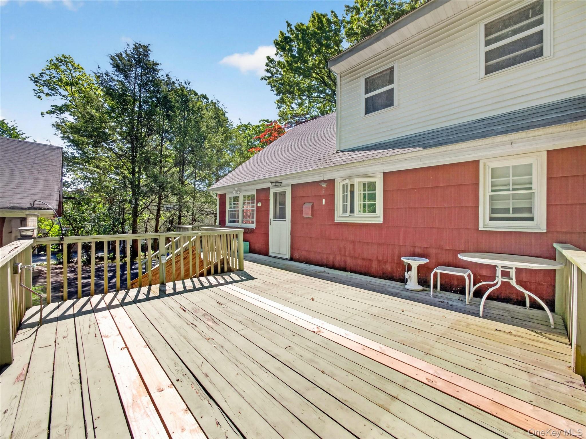 56 Oak Road New City, NY 10956 - Photo 12 of 30 a view of a house with wooden deck