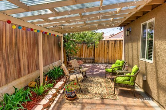 718 La Paloma Street Ridgecrest, CA 93555 - Photo 46 of 50 a house view with a seating space