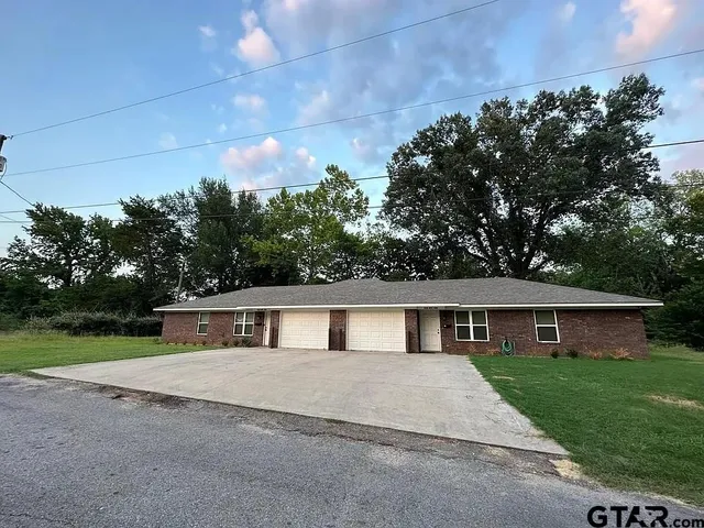 a house view with a outdoor space