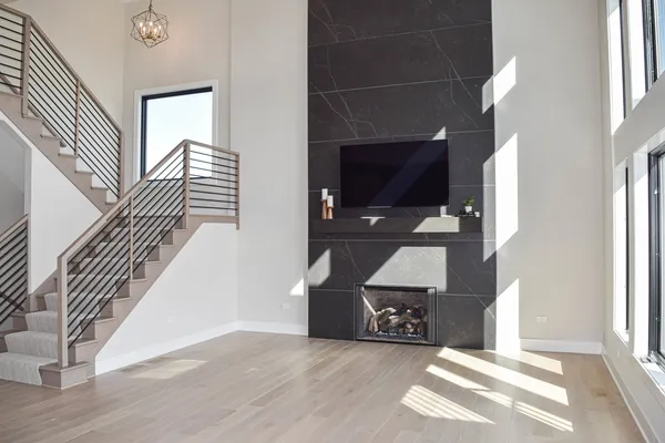 an entryway and livingroom with furniture